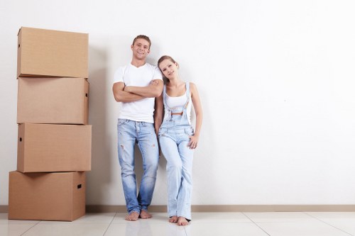 Furniture removals team planning a move in Clapham street