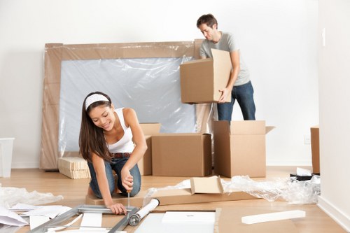 Flat removals in Clapham with moving boxes and a removal van
