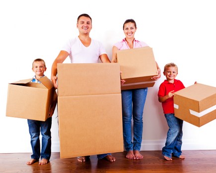 Removal team handling household items during a scheduled move