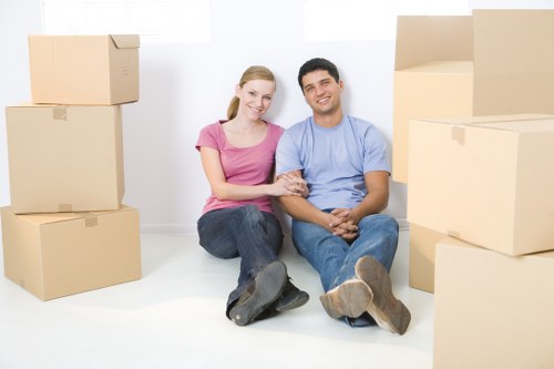 Professional movers packing household items in Clapham