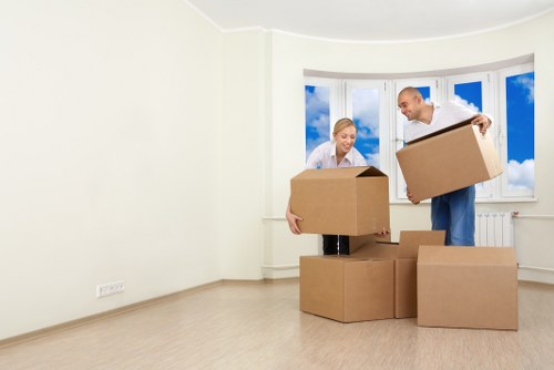 Professional movers handling apartment furniture in Clapham