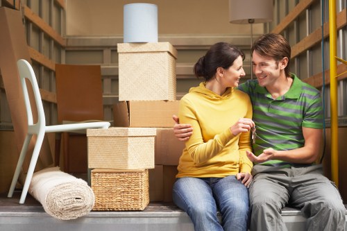 Professional movers handling household items during a Clapham relocation