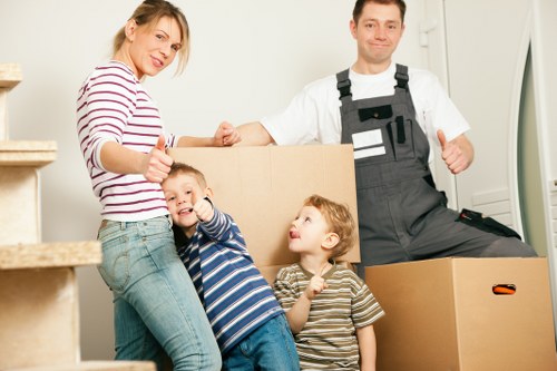 Insurance paperwork and moving team planning a relocation